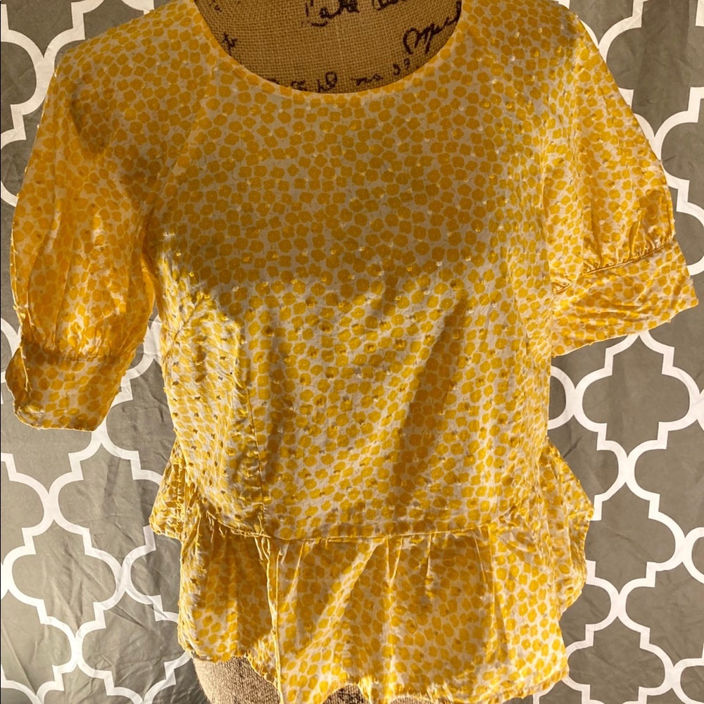 Yellow Preplum shirt.